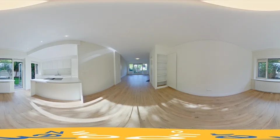 360-opname van de eetkamer met doorkijk naar de keuken en de woonkamer